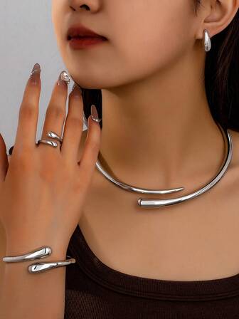 一套时尚合金水滴形元素耳环、戒指、手链、波浪项链组合，适合女性日常佩戴、礼物、海滩派对