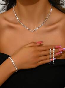 Ensemble de bijoux à la mode et luxueux, composé d'une chaîne de clavicule, de boucles d'oreilles, d'un collier et d'un bracelet, idéal pour un usage quotidien, un mariage, un banquet ou une fête.