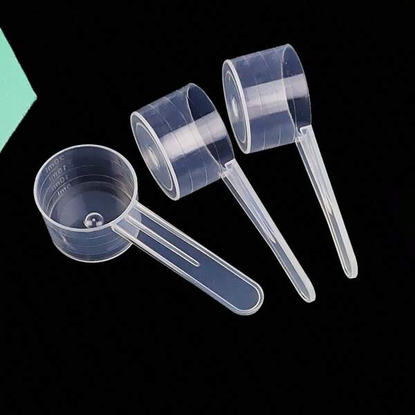 Cucharada de 10g y taza medidora transparente de fondo plano de 20ml, cucharón para detergente en polvo, cucharón para pesaje de proteína en polvo, taza medidora de líquido empaquetada individualmente, útiles escolares
