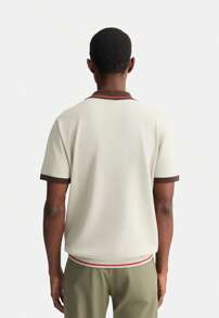Polo grigia in maglia