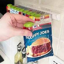 A Mixing Bag Hole Free Rotating Wall Storage Rack, The Kitchen Is Neat And Not Messy, Increase The Kitchen Storage Space, A Variety Of Mixing Bags Sealed From Moisture, The Left And Right Design Can Be Adjusted For Easy Access, While Storing A Variety Of Seasoning Bags, Sealing Clip Mixing Bag Storage, Cooking Seasoning More Convenient