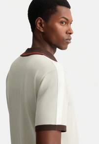 Polo grigia in maglia