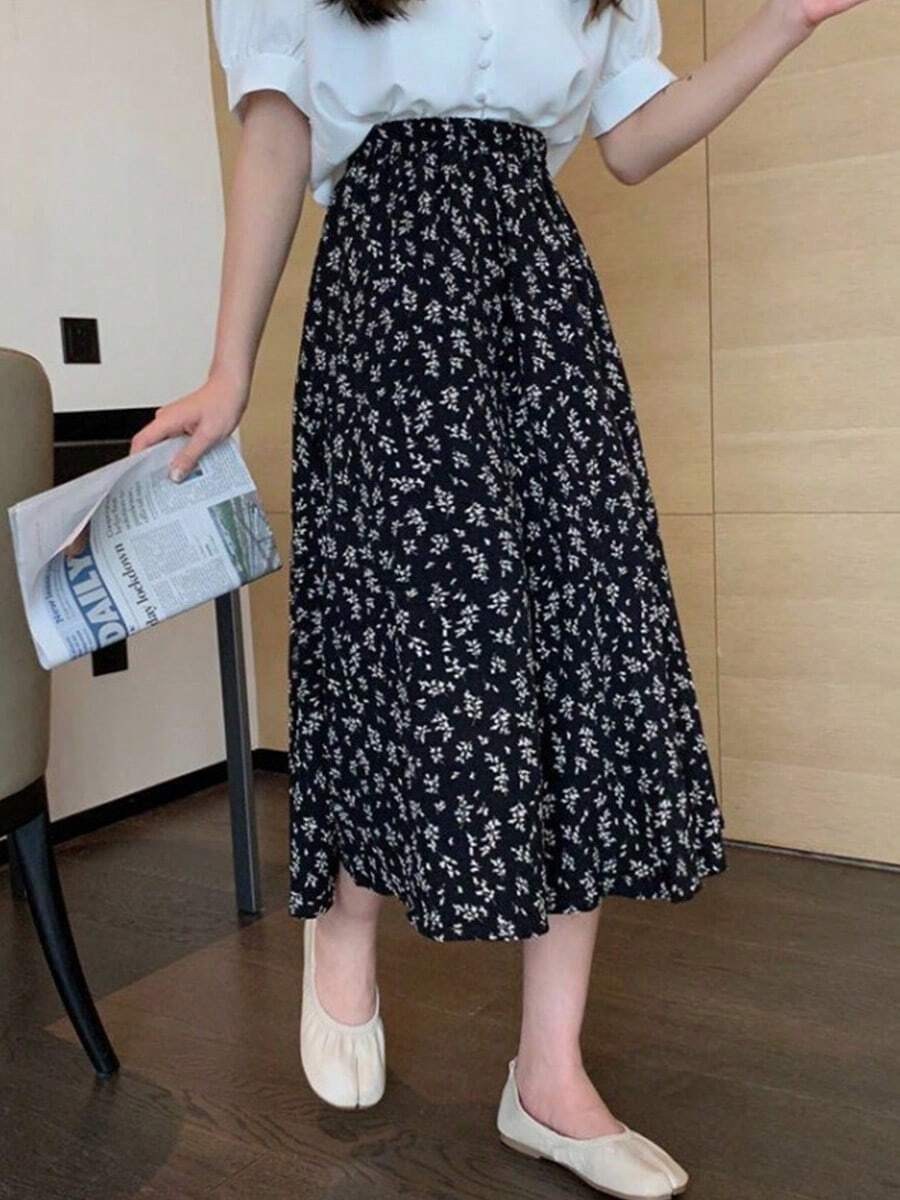 Las mujeres impresas falda de medio cuerpo primavera y verano nueva palabra falda de hadas floral delgado de longitud media de cintura alta delgada falda floral - Negro - Ver 1