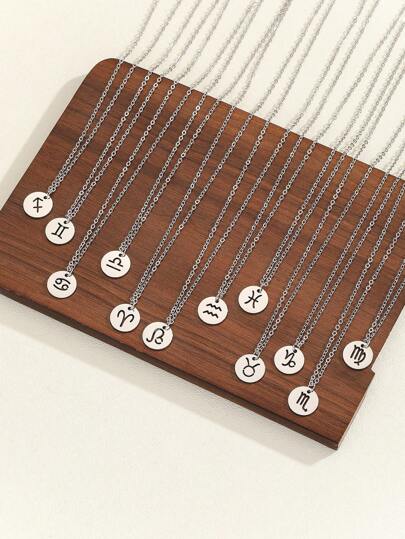 قلادة فضية معدنية مصنوعة من الصلب بشكل دائري تمثل 12 برج من الأبراج الفلكية ، تصميم بسيط عصري