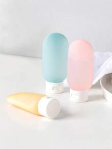 مجموعة من 3/4 زجاجات سفر من السيليكون والبلاستيك، سعة 2.03 أونصة، قابلة لإعادة الملء، منع التسرب، حاويات مستحضرات تجميلية بلا رائحة للكريمات والعناية بالبشرة والاستحمام، طقم أدوات تجميل صغيرة محمولة - متعدد الألوان - مشاهدة 5