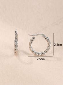 A Pair Of Fashionable And Versatile Round Twisted Stainless Steel Earrings Suitable For Ladies To Wear Daily.