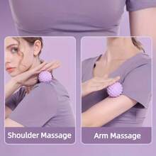 1个5厘米紫色带凸点瑜伽球，凸点设计增强按摩效果，同时锻炼和放松肌肉，采用加厚抗爆材料制成，经久耐用，适用于家庭健身、瑜伽训练、康复治疗，有助于塑造完美身材，使锻炼更高效、更舒适