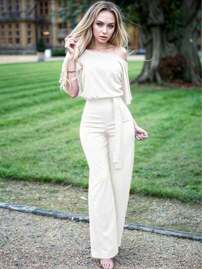 Mono largo elegante para mujer xally 123 con mangas de media capa y cuello vuelto, diseño de pierna ancha, confeccionado en tejido elástico medio, ideal para fiestas.