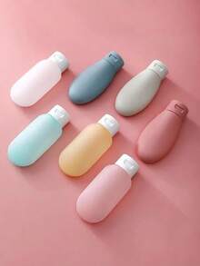 مجموعة من 3/4 زجاجات سفر من السيليكون والبلاستيك، سعة 2.03 أونصة، قابلة لإعادة الملء، منع التسرب، حاويات مستحضرات تجميلية بلا رائحة للكريمات والعناية بالبشرة والاستحمام، طقم أدوات تجميل صغيرة محمولة - متعدد الألوان - مشاهدة 4