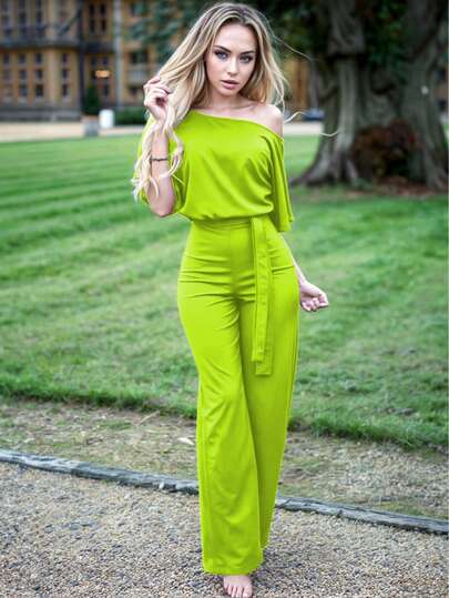 Mono largo elegante para mujer xally 123 con mangas de media capa y cuello vuelto, diseño de pierna ancha, confeccionado en tejido elástico medio, ideal para fiestas.