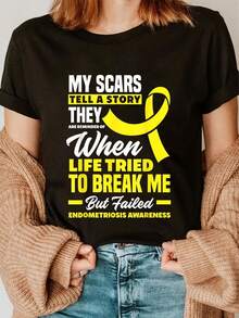 Empowering Camiseta gráfica negra para mujer - "My Scars Tell A Story: Endometriosis Awareness" - Top motivacional de algodón con cuello redondo y manga corta, mensaje inspirador amarillo atrevido - 180 g de ropa informal suave, camiseta con estampado resistente y edificante, regalo perfecto - Negro - Ver 1