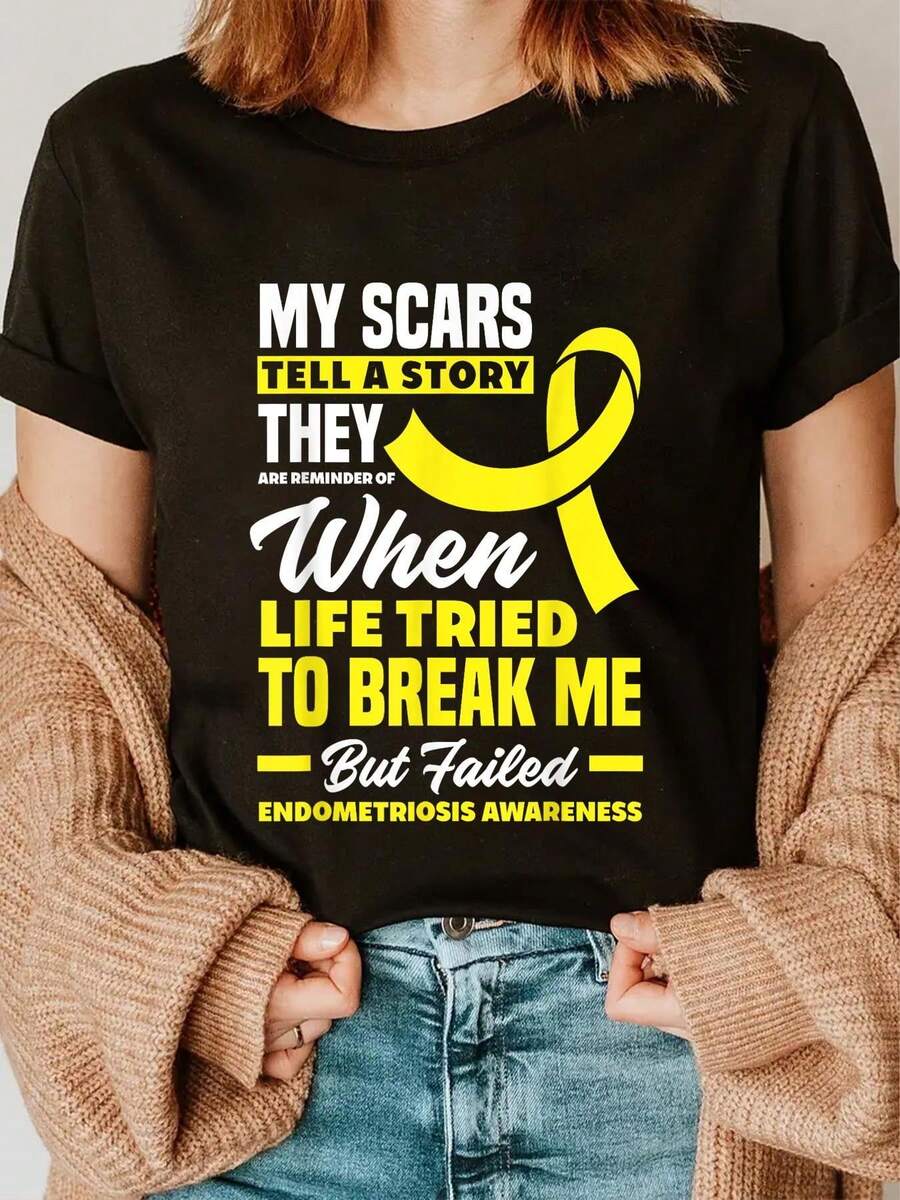 Empowering Camiseta gráfica negra para mujer - "My Scars Tell A Story: Endometriosis Awareness" - Top motivacional de algodón con cuello redondo y manga corta, mensaje inspirador amarillo atrevido - 180 g de ropa informal suave, camiseta con estampado resistente y edificante, regalo perfecto - Negro - Ver 1
