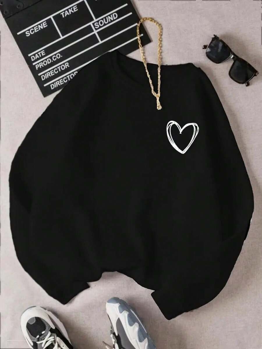 Bonita sudadera negra de manga larga con cuello redondo para mujer, informal, de largo regular, con forro cálido y detalle de corazón. - Negro - Ver 1