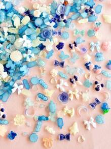 100-120 piezas Conjunto aleatorio con talla grande de una docena de estilos de instalaciones de arte de uñas DIY que incluye moños, conejos, corazones, camelias, rosas, uvas, libélulas, osos, pajaritas, modelos luminosos, modelos de aurora, mariposas, gotas de agua, girasoles, formas de dibujos animados, etc. para decoración de estuches de teléfonos móviles, donde niños y niñas pueden elegir entre una variedad de colores