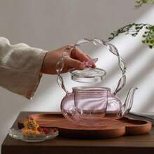 1个650毫升创意蝴蝶形玻璃茶壶带浸泡器 回到学校