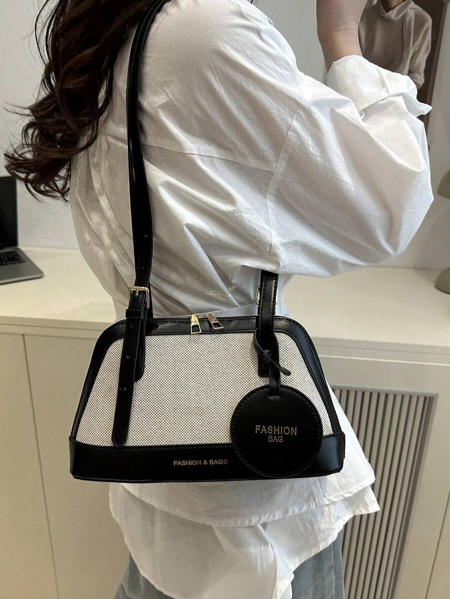 Bolso de mano de mujer con cremallera en la parte inferior, de diseño a bloques de color, de moda - Negro - Ver 1