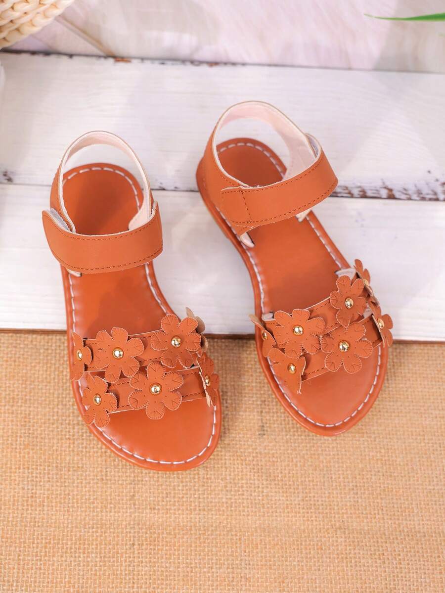 1 par de sandalias decoradas con flores para niñas, de material cómodo, con punta abierta, correa con gancho y bucle, tacón plano, estilo dulce, uso casual - Marrón - Ver 1