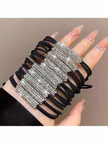 Luxury Rhinestone Ponytail Holders: Set Of 5 Elegant Black Elastic Hair Ropes Decorated With Brilliant Crystal Accents, Providing A Strong And Gentle Hold For All Hair Types, Adds A Touch Of Sparkle And Refinement To Ponytails, Top Knots, Half-Up Styles, And Braids, Perfect For Adding A Touch Of Glamour To Everyday Looks, Dressing Up For Special Events, Dance Recitals, Cheerleading, And More, Durable And Stretchy Elastic Ensures Long-Lasting Use Without Snagging Or Breaking Hair, Makes A Stylish And Practical Gift For Women And Girls Who Appreciate Fashionable And Functional Hair Accessories, Elevate Your Hairstyles Effortlessly With These Exquisite And Secure Rhinestone Ponytail Holders, Adding A Touch Of Dazzling Charm To Any Occasion.