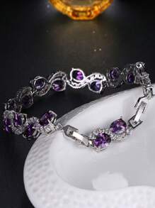 Pulsera elegante y lujosa en forma de S con circonita sintética ovalada de color púrpura, elegante para usar en el trabajo o en fiestas como accesorio