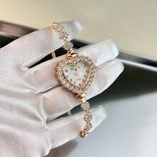 1 chiếc đồng hồ thạch anh thời trang nữ hình trái tim đính đá Rhinestone, mặt số Ả Rập, dây đeo có thể thu vào, phong cách thoải mái - Hoa hồng vàng - Xem 8