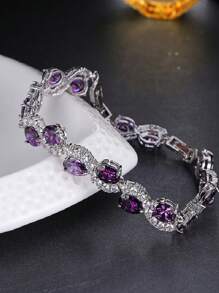 Pulsera elegante y lujosa en forma de S con circonita sintética ovalada de color púrpura, elegante para usar en el trabajo o en fiestas como accesorio