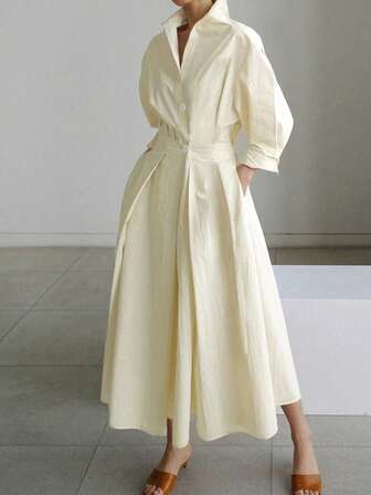 春夏新款纯色通勤时尚V领收腰大摆纽扣