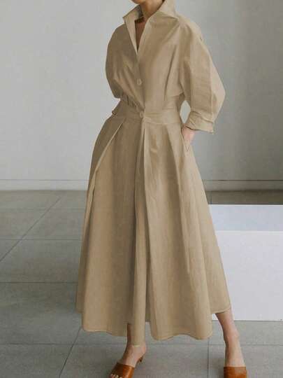 Nuevo estilo de primavera y verano Tapa en unicolor de moda de pasajeros con cuello en V y cintura con grandes botones