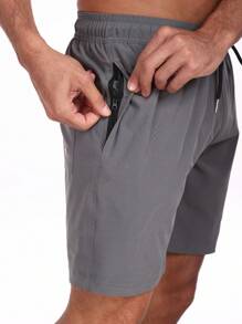 Nuovi pantaloncini casual da uomo per l'estate con tasche con cerniera, pantaloncini da spiaggia con fodera in doppio strato di seta latte, taglie oversize