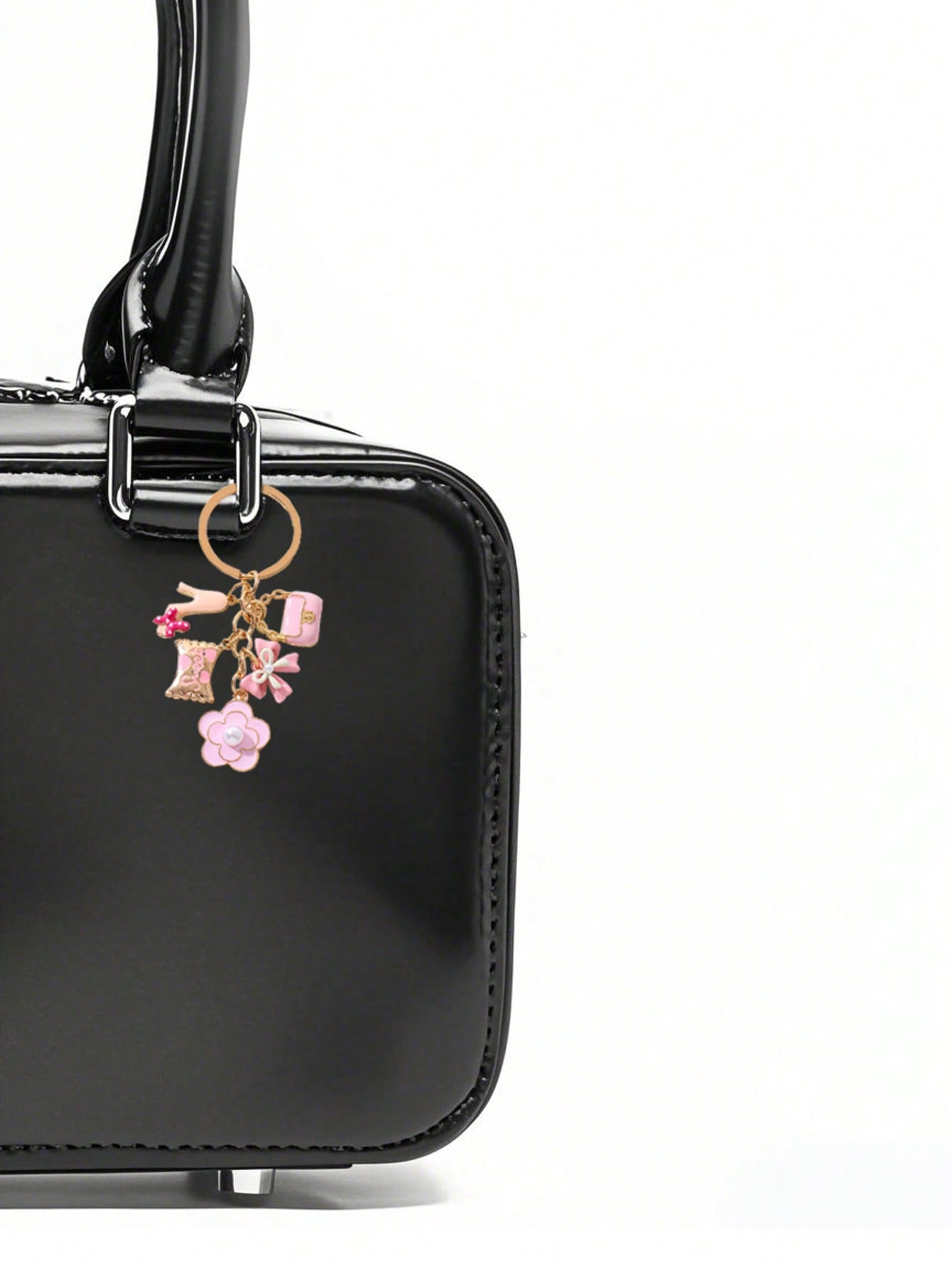 سلسلة مفاتيح زهرية معدنية صغيرة وردية اللون