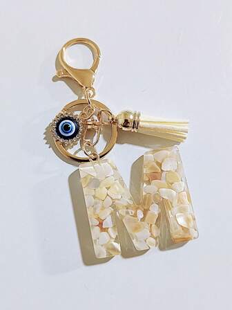 1 pieza Llavero de resina con forma de corazón, estilo casual y lindo, con borla y letras de pegamento en color beige, decoración creativa para amigos, mochila escolar, ideas de regalo de Navidad