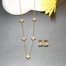 Conjunto de joyas de acero inoxidable 316L con flores doradas incrustadas de piedras de circonita, incluyendo collar, pendientes, pulsera y anillo, un conjunto de joyas para niñas que no se desvanece
