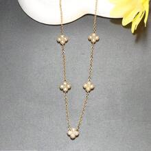 Conjunto de joyas de acero inoxidable 316L con flores doradas incrustadas de piedras de circonita, incluyendo collar, pendientes, pulsera y anillo, un conjunto de joyas para niñas que no se desvanece