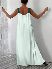 Vestido midi de tirantes finos con estampado floral, ideal para vacaciones