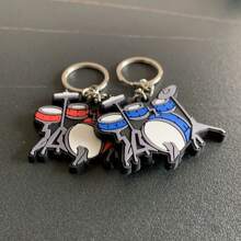 2 Stück doppelseitige Silikon Drum Schlüsselanhänger, rot & blau Farbe, musikalisches Paar Rucksack Zubehör, Überraschungsgeschenk für Freunde, Festival Party Auto Zubehör Taschenverschluss Schulbriefaccessoire