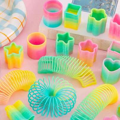 24 piezas/Regalos de fiesta de arcoíris de otoño e invierno, juguetes de plástico mini en formas y colores aleatorios, juguetes elásticos de muelle en espiral de descompresión, adecuados como regalos de cumpleaños para hombres y mujeres, premios de carnaval, relleno de bolsas de regalo, relleno de bolsas de regalo de Navidad
