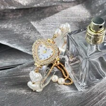 1 pièce Montre à quartz mode mignonne pour femmes avec boîtier en alliage décoré de perles en forme de cœur bicolore et cadran chiffres arabes