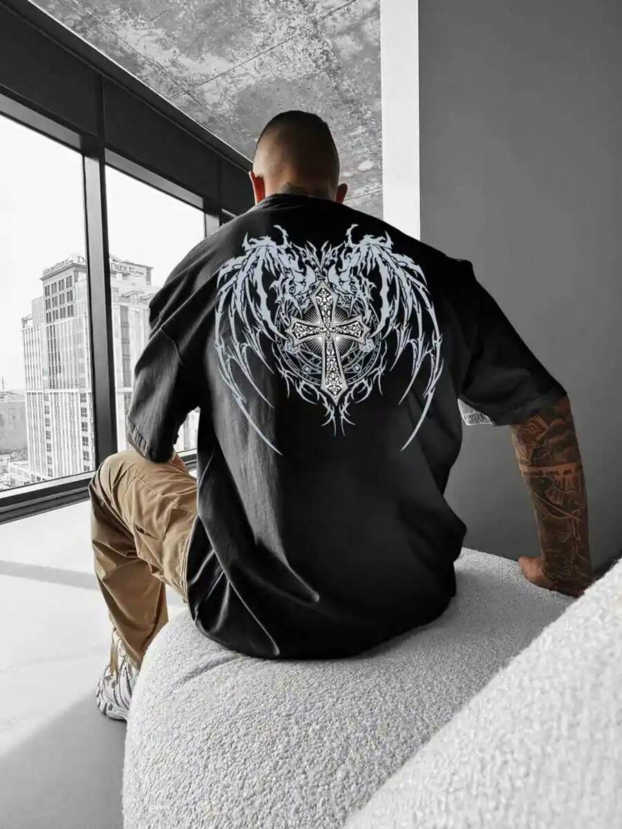 For Those Drawn To Edgy, Religious - Inspired Fashion! Our Tee, Made From 100% Cotton With A Classic Crewneck, Ensures Comfort. The Front Features A Detailed Cross Graphic, While The Back Showcases An Elaborate Wing - And - Cross Design. Ideal For Individuals Who Want To Express Their Style With A Spiritual Touch, Perfect For Casual Outings, Concerts, Or Daily Wear. - Black - View 1