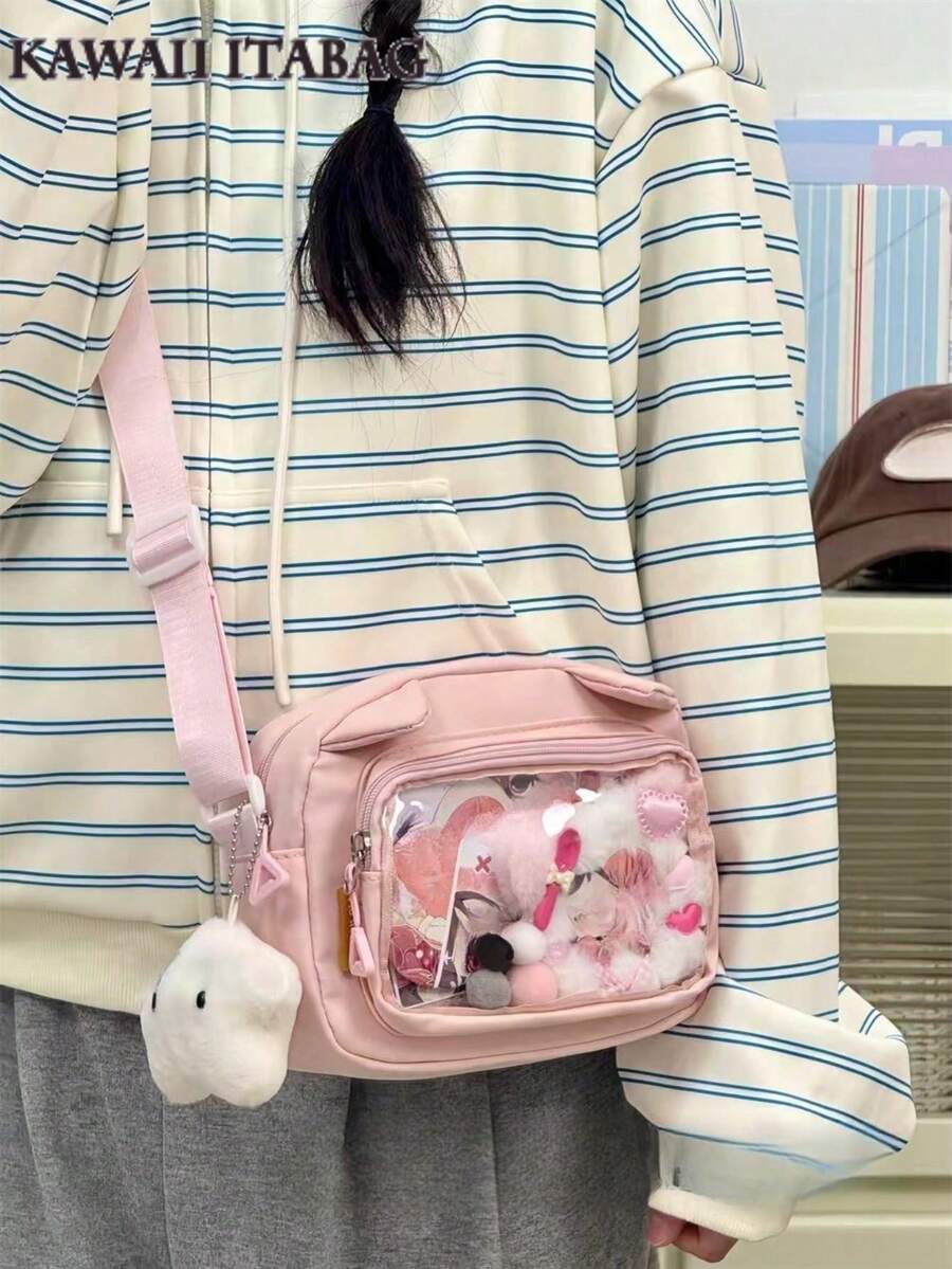 Túi trong suốt kiểu Lolita Nhật Bản dễ thương có tai, túi xách trong suốt, túi đeo chéo nhỏ, túi đeo vai nữ, túi cầm tay, chất liệu nylon PVC, dễ mang theo, có bảng gắn huy hiệu, túi nylon chất lượng cao, quà tặng cho bé gái, túi thời trang mới năm 2025. - Hồng - Xem 1