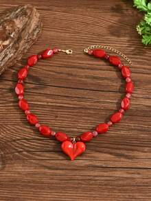 1件优雅时尚金色爱心吊坠项链，橙红色树脂3D爱心吊坠，法式滴油工艺，金色链条，不对称串珠，多种款式可选，高品质女士项链，适合日常佩戴、度假、派对、搭配性感服饰。请注意，每个树脂吊坠底部都有注塑成型的浇口。