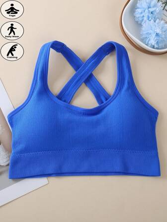 Dam sport-bh med enfärgad korsrygg och korsband, sval ljusblå