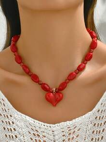 1件优雅时尚金色爱心吊坠项链，橙红色树脂3D爱心吊坠，法式滴油工艺，金色链条，不对称串珠，多种款式可选，高品质女士项链，适合日常佩戴、度假、派对、搭配性感服饰。请注意，每个树脂吊坠底部都有注塑成型的浇口。