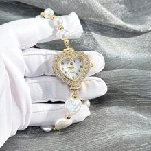 1 pièce Montre à quartz mode mignonne pour femmes avec boîtier en alliage décoré de perles en forme de cœur bicolore et cadran chiffres arabes