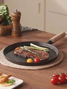 1 Stück 7,87/10,23 Zoll Gusseisenpfanne mit Holzgriff, Tortillapfanne, Gusseisenpfanne. Sie hat eine antihaftbeschichtete Oberfläche und eignet sich für die Zubereitung von Omeletts, Steaks, Frikadellen, Speck und Pfannkuchen. Dies ist ein vielseitiges Kochwerkzeug für die Zubereitung von Frühstück und Pfannkuchen.