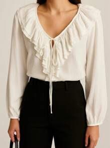 SHIRT MADE OF COTTON AND SYNTHETIC LINEN WITH RUFFLES AND V-NECKLINE