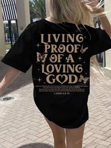 Summer Christian Graphic T-Shirt, Bible Verse Print "Living Proof Of A Loving God, I John 4:9-10", Casual Loose Fit Batwing Short Sleeve Tee, Suitable For Summer Vacation & Christian Women