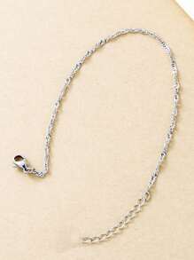 1 Stück Gedrehtes Knöchelband, minimalistisches Edelstahl Wellen-Ketten Knöchelband, einfaches glitzerndes Strand Knöchelband für Frauen
