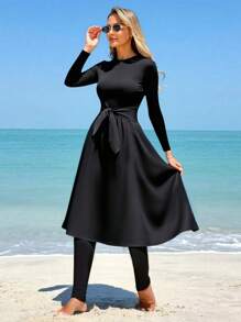 Costume da bagno tutta copertura a due pezzi in maglia tinta unita, con maniche lunghe e pantaloni lunghi, adatto come abbigliamento da spiaggia e resort, disponibile in taglie comode