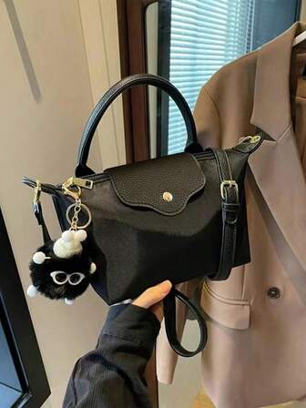 På vintern är den nya fashionabla handväskan Mini med kontrastfärg, axelväska i nylon, vattentät tygväska, fyrkantig väska och grönsakskorgsväska lämpliga för pendling till jobbet, fester och semesterdatum.