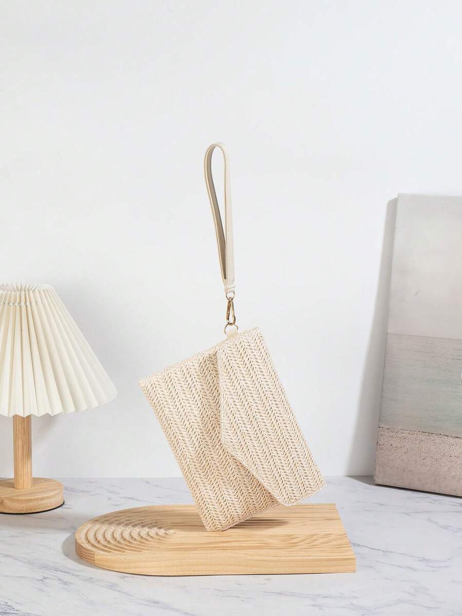 新款欧美风编织斜挎包，假日草编包，时尚便携收纳包，编织零钱包，沙滩包，编织腕包，编织手拿包，夏季必备单品，最佳搭配配饰。