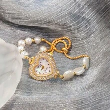1 pièce Montre à quartz mode mignonne pour femmes avec boîtier en alliage décoré de perles en forme de cœur bicolore et cadran chiffres arabes